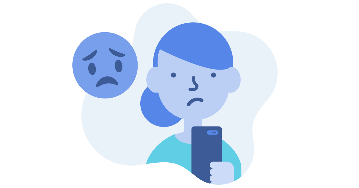 Tiener die een telefoon met droevige emoji bekijkt
