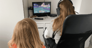 Adele Jennings' children play a video game on PC.