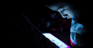 Girl looking at her phone screen