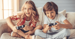 boy and girl playing on a game console