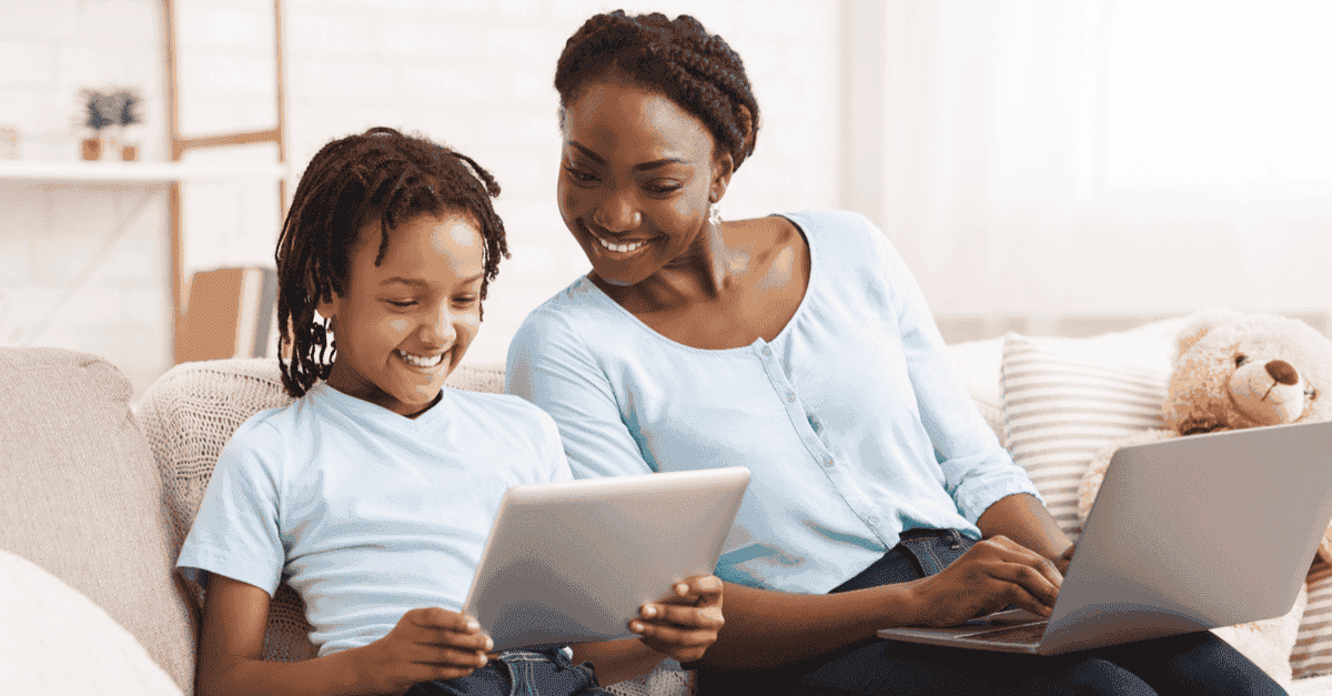 Mother and child happy on devices