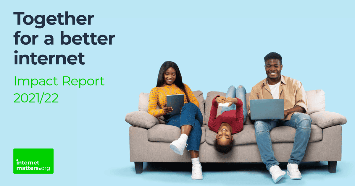 Mum and dad sitting on a sofa with devices while their child lays upside down with their own device. Text reads "Together for a better internet impact report 2021/22