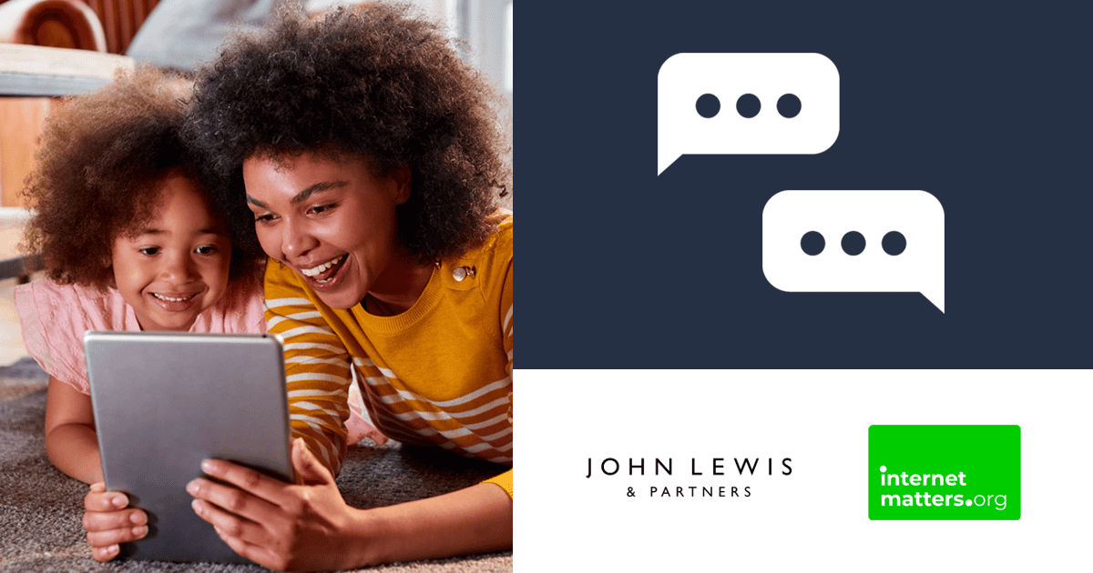 A mother and young daughter look at a tablet on the floor on their stomachs together. The John Lewis and Partners and Internet Matters logos sit beneath.