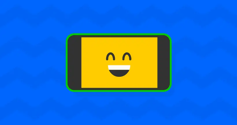 een glimlach-emoji op een smartphonescherm