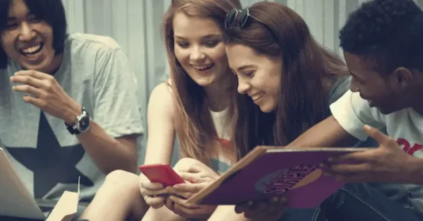 Teens using a phone