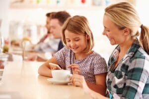 Child-and-mum-on-phone