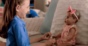 girl playing with a doll
