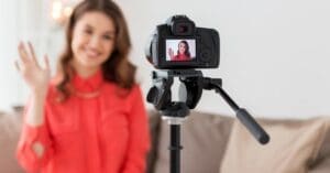 A vlogger in front of her camera