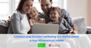 A family using a laptop together