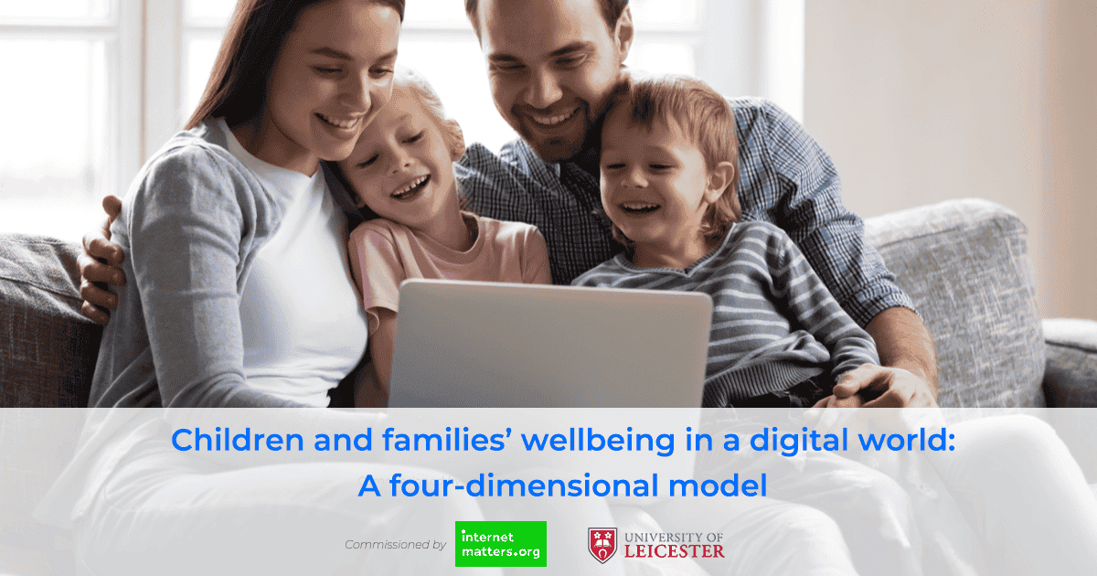 A family using a laptop together