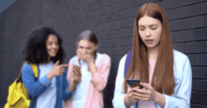 A teen being cyberbullied