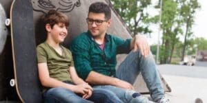 Father and son talking