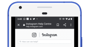 A phone showing the Instagram help centre