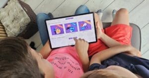 Children on tablet using the online together project