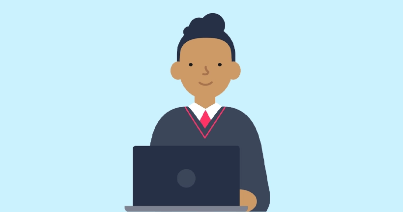 A pre-teen uses a laptop.