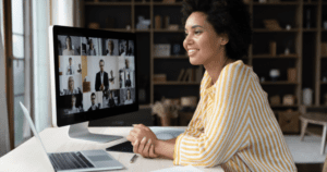 Professional working from home during a virtual team meeting.