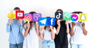 Social media logos being held by children
