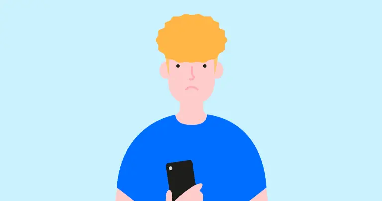 A teen using their smartphone while being sad.