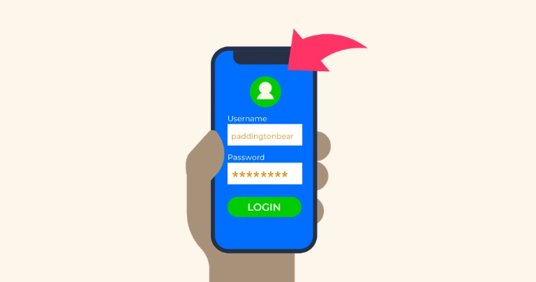 A hand holding a smartphone with a login screen. The username says 'paddingtonbear' but the password is blocked out.